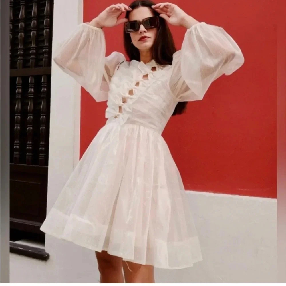 Gold bow front mini dress. Sofie the Label